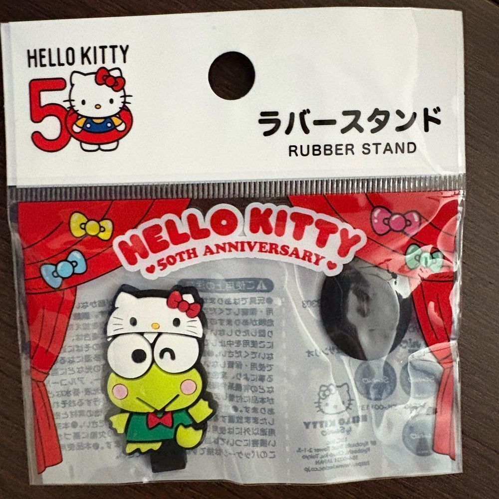 Hello Kitty 50th Anniversary Rubber Stand with Red and Green Accents